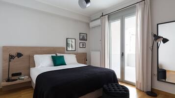 Apartment | Desk, laptop workspace, blackout drapes, iron/ironing board