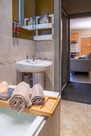 Hair dryer, bathrobes, towels, soap