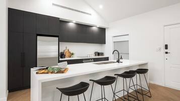 Coffee/tea maker, fridge, microwave, oven