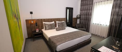Deluxe Double Room, 1 Double Bed, City View | Minibar, in-room safe, desk, blackout drapes