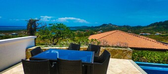 "SLOW M’OCEAN VIEWS"  Golf Course & Resort