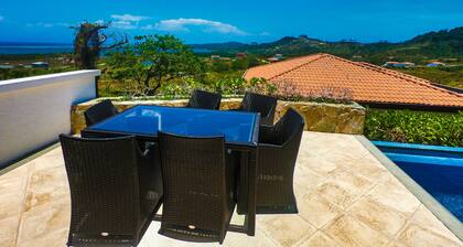 "SLOW M’OCEAN VIEWS" Golf Course & Resort