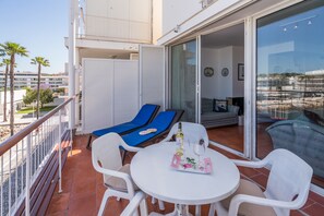 Relax on the balcony with a glass of wine and enjoy the view of the surrounding neighborhood.