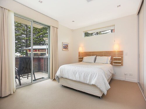 Breeze Beachfront Apartment 1: Ocean Views and Convenient Ground Floor Access!