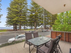 Outdoor dining - Breeze Beachfront Apartment 1: Ocean Views and Convenient Ground Floor Access! (Victor Harbor)
