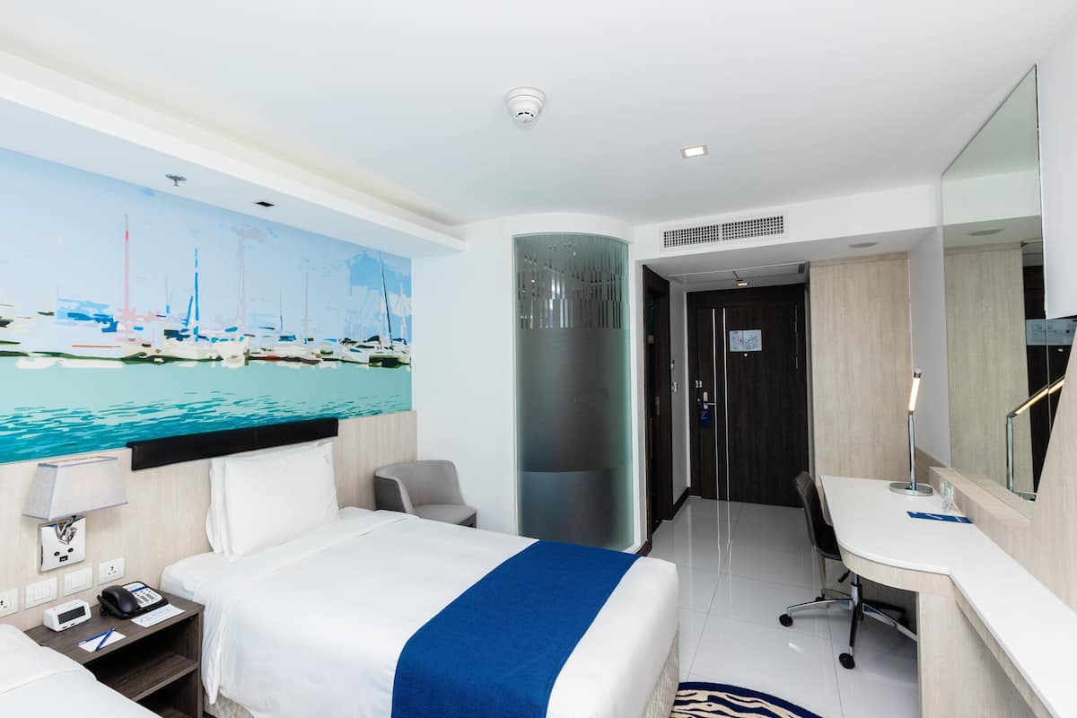 Premium bedding, in-room safe, individually decorated