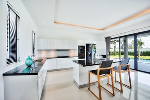 Luxury Bungalow, 3 Bedrooms | Private kitchen | Full-size fridge, microwave, oven, stovetop - Clouds Infinity (Cha-am)