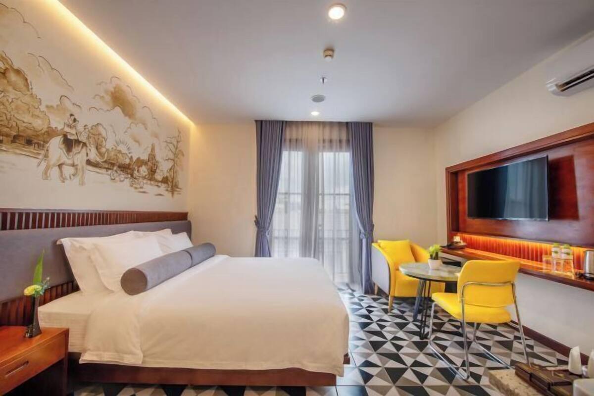 Ropa de cama de alta calidad y tabla de planchar con plancha