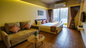 Deluxe Room | Premium bedding, blackout drapes, iron/ironing board, bed sheets