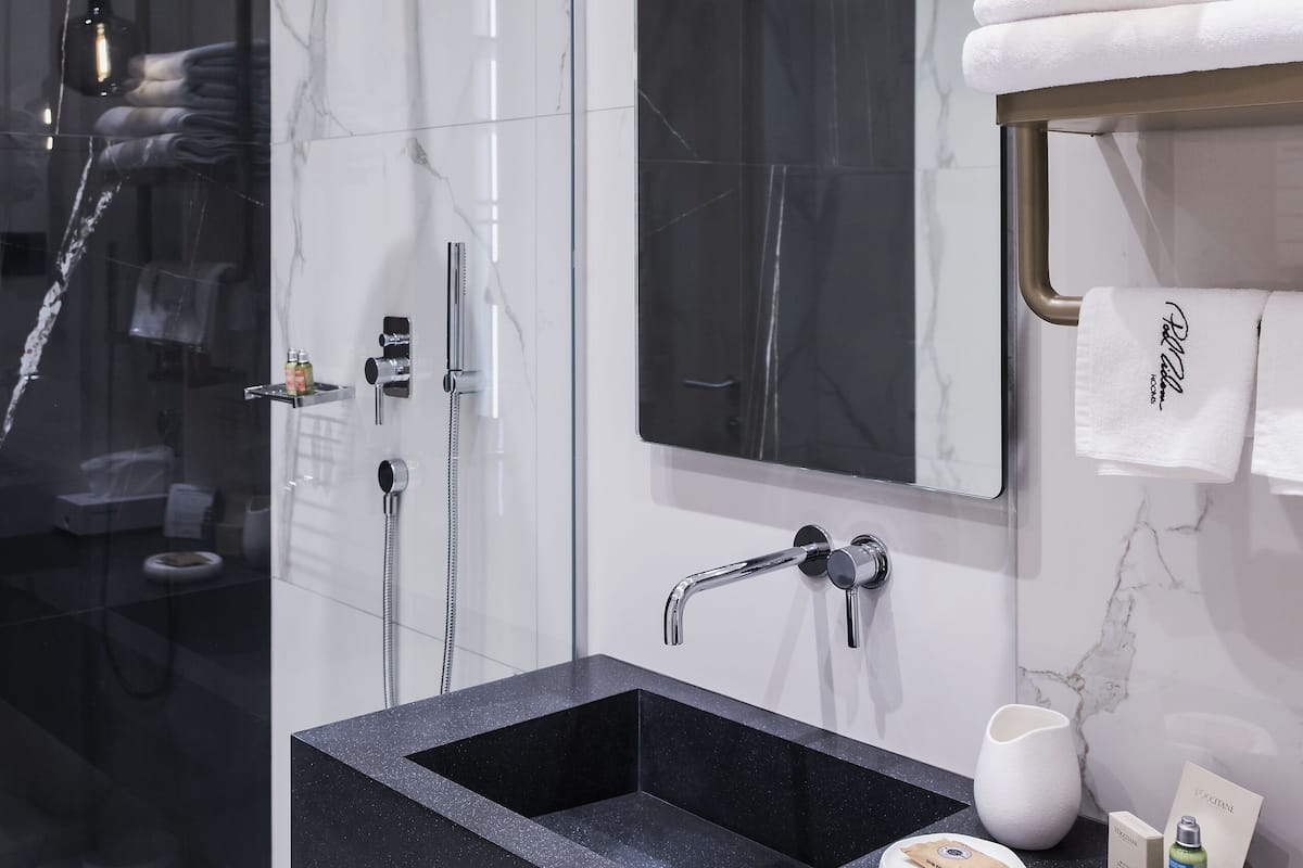 shower, free toiletries, slippers, towels