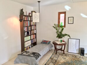 Departamento urbano | Tabla de planchar con plancha, camas extra, wifi gratis y ropa de cama