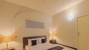 Family Room | In-room safe, desk, iron/ironing board (on request), WiFi (free) - CAPITAL O133 Al Sawadi Beach Resort & Spa (Barka)