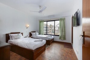 Blackout drapes, rollaway beds, free WiFi, bed sheets - Pacific Guest House (Kathmandu)