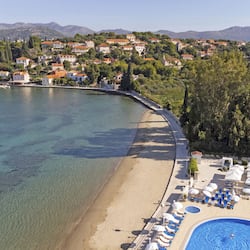 On the beach, sun-loungers, beach umbrellas, beach massages
