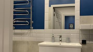 Design Apartment, 1 King Bed with Sofa bed | Bathroom | Shower, free toiletries, hair dryer, slippers