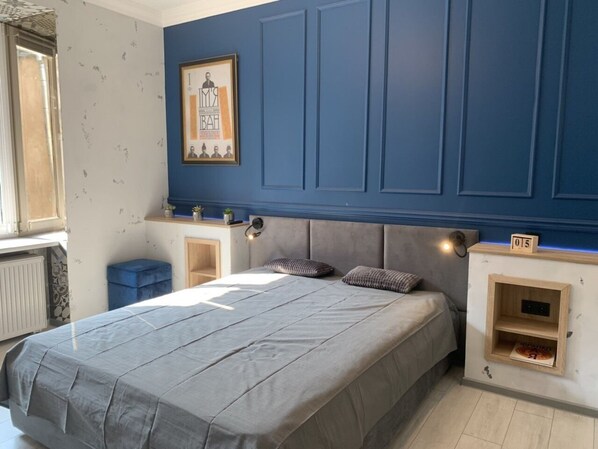 Design appartement, 1 kingsize bed met slaapbank | Een strijkplank/strijkijzer, gratis wifi, beddengoed