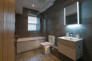 Combined shower/bathtub, hair dryer