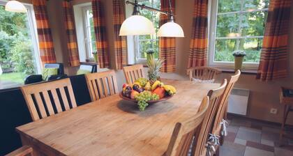 Luxury detached villa with sauna and wood-burning stove and unobstructed view over farmlands