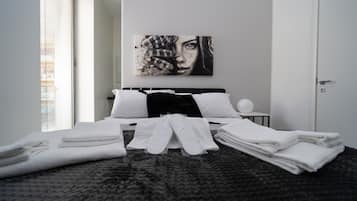 Premium bedding, down comforters, memory foam beds, minibar