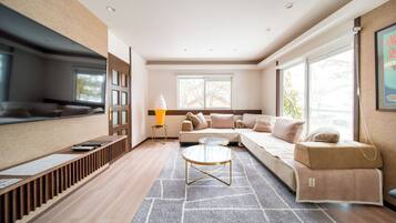 Family House, 5 Bedrooms | Living area | 65-inch Smart TV with cable channels