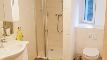 Comfort Apartment | Bathroom | Shower, hair dryer, towels