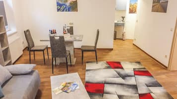 Comfort Apartment | Living area | Flat-screen TV