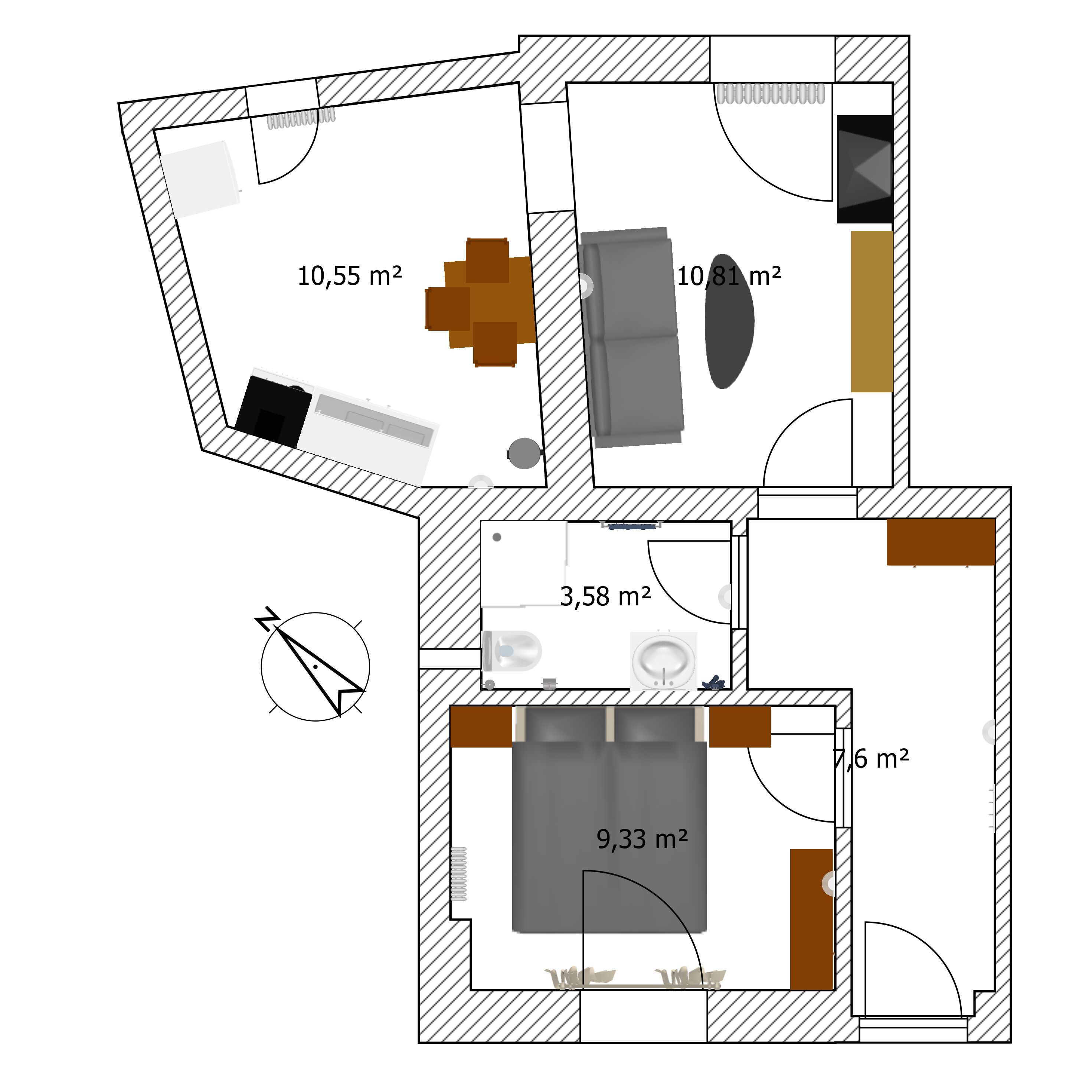 A floor plan of a hotel room with a bed, a bathroom, a seating area, and a small kitchen.