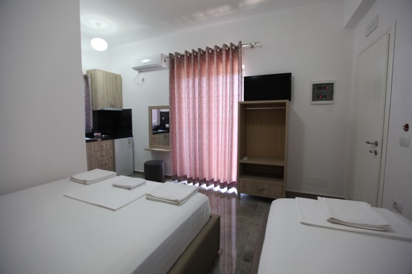 Triple Room, Balcony | Private kitchenette | Coffee/tea maker, fridge, stovetop, electric kettle