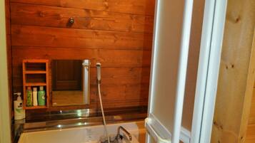 Apartment, 2 Bedrooms | Bathroom | Separate bathtub and shower, deep-soaking bathtub, free toiletries