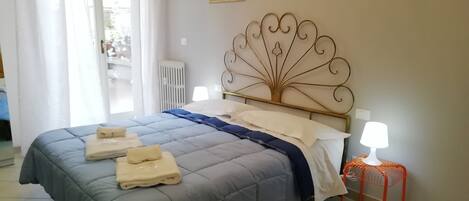 Premium bedding, desk, laptop workspace, soundproofing