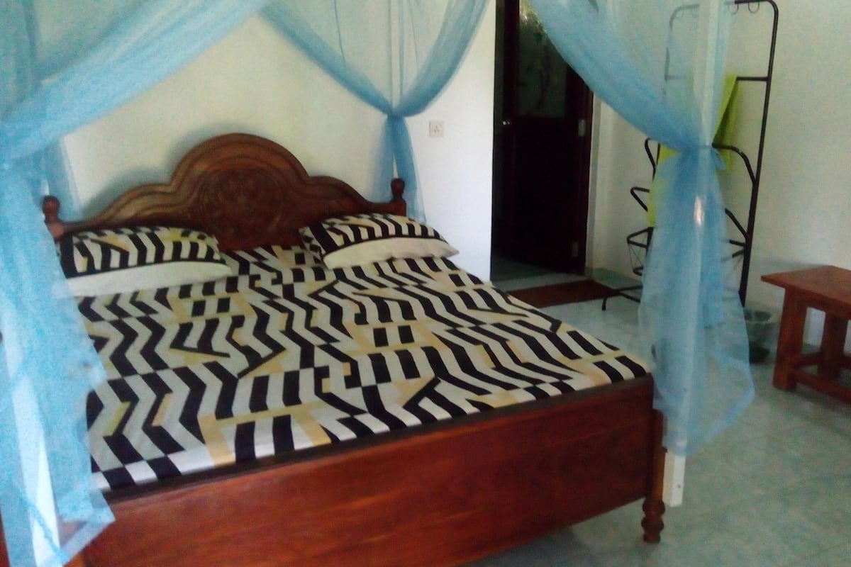 Standard Double Room, 1 King Bed, Lagoon View | 7 bedrooms, in-room safe, blackout curtains, iron/ironing board