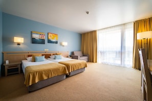 Standard Double Room, Balcony, Partial Sea View | Minibar, in-room safe, desk, soundproofing