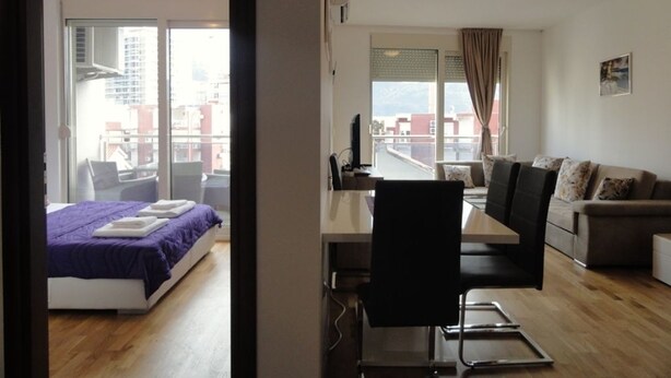 Elite Apartment, Partial Sea View | Living area | LCD TV - Center Apartment C 25 (Budva)