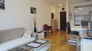Elite Apartment, Partial Sea View | Living area | LCD TV - Center Apartment C 25 (Budva)