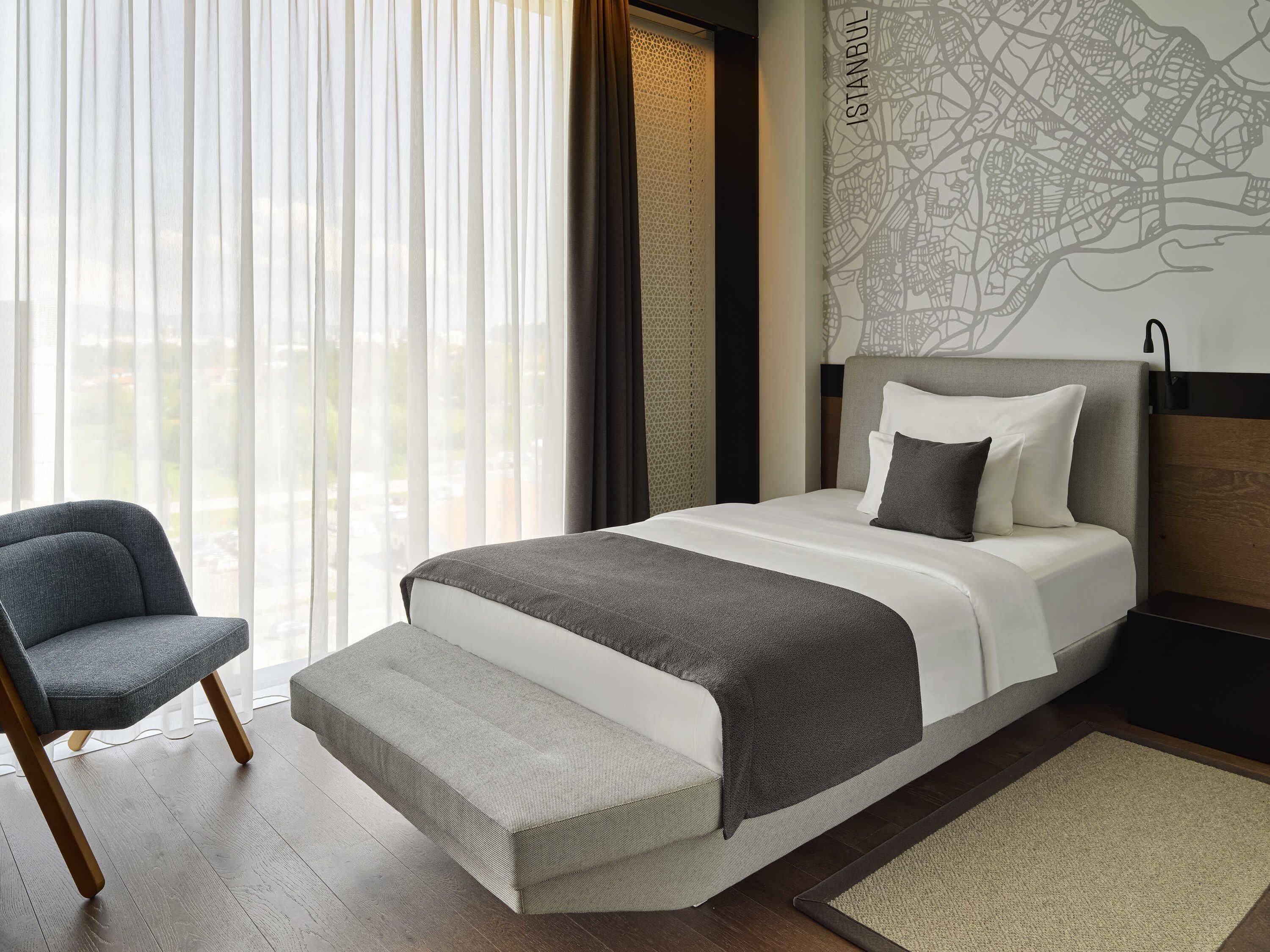 Superior kamer, 1 eenpersoonsbed | Luxe beddengoed, pillowtop-bedden, een minibar, een kluis op de kamer