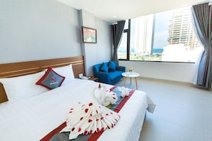 Apartment, 1 Bedroom, Sea View | Minibar, desk, blackout drapes, iron/ironing board - Vivian Hotel (Da Nang)