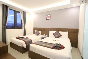 Triple Room | Minibar, desk, blackout drapes, iron/ironing board - Vivian Hotel (Da Nang)