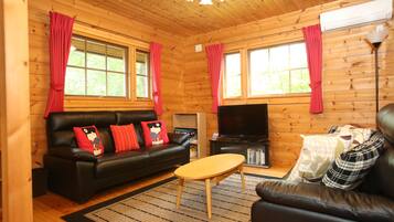 Family House, 3 Bedrooms | Living area | TV