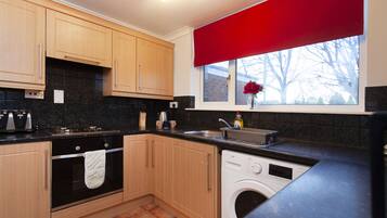 Family House, Multiple Beds | Private kitchen | Full-size fridge, microwave, oven, stovetop