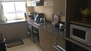 Standard Apartment, 3 Bedrooms, Pool View (G-94) | Private kitchen | Fridge, microwave, oven, stovetop