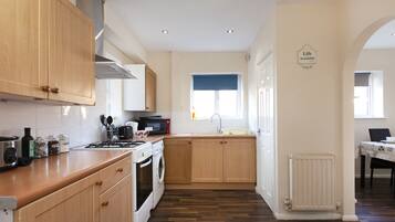 Family House, Multiple Beds | Private kitchen | Full-size fridge, microwave, oven, stovetop