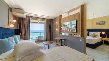 Family Room, Balcony, Sea View | Minibar, in-room safe, free cots/infant beds, free WiFi