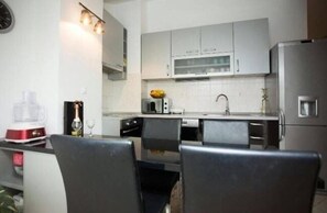 Apartment, Multiple Beds | Private kitchen
