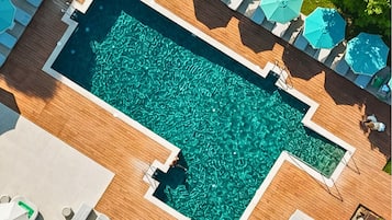 2 outdoor pools, open 8:00 AM to 8:00 PM, pool umbrellas, pool loungers