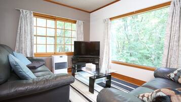 Family House, 3 Bedrooms | Living area | TV