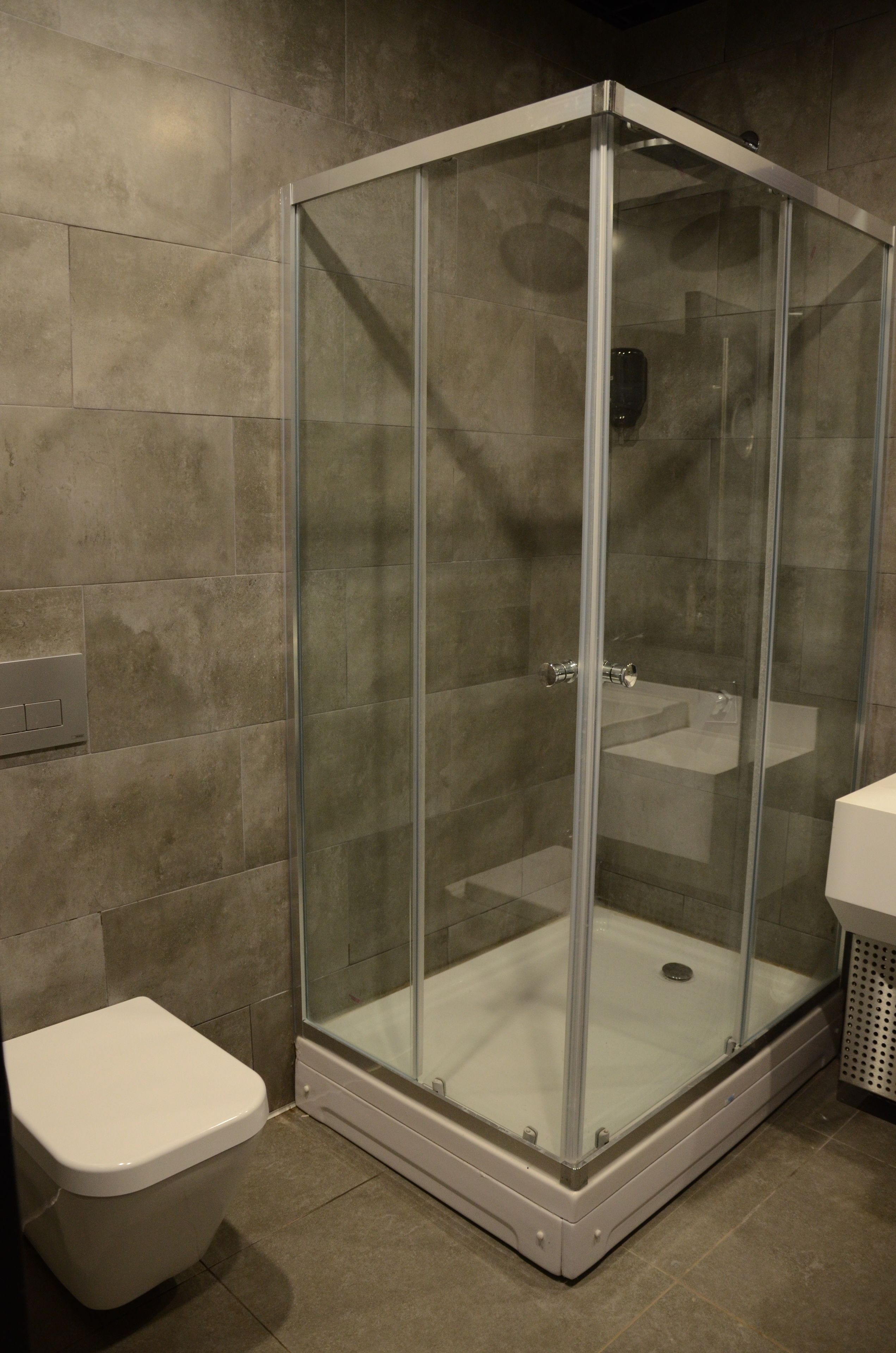 grand room | bathroom | shower, free toiletries, slippers, towels