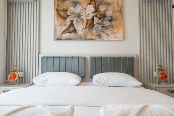 Egyptian cotton sheets, premium bedding, down duvets, memory-foam beds