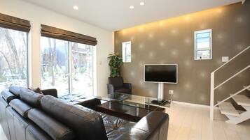 Comfort Chalet, 2 Bedrooms | Living area | Flat-screen TV, heated floors
