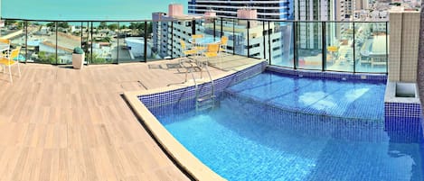 Outdoor pool, pool umbrellas, pool loungers