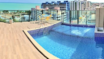 Outdoor pool, pool umbrellas, pool loungers